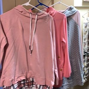 3 pink hoodies